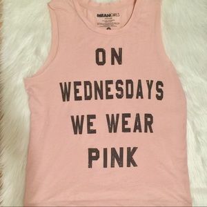 On Wednesday's We wear pink sleeveless tee.